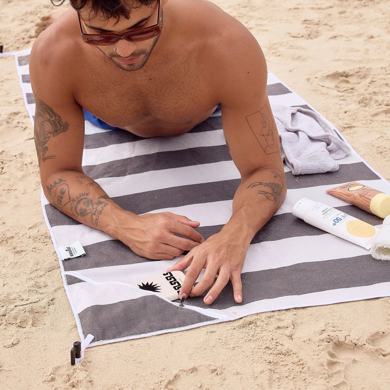 From the Beach to the Train: Why a Travel Towel Is the Most Versatile Thing in Your Backpack - Nomadique Co