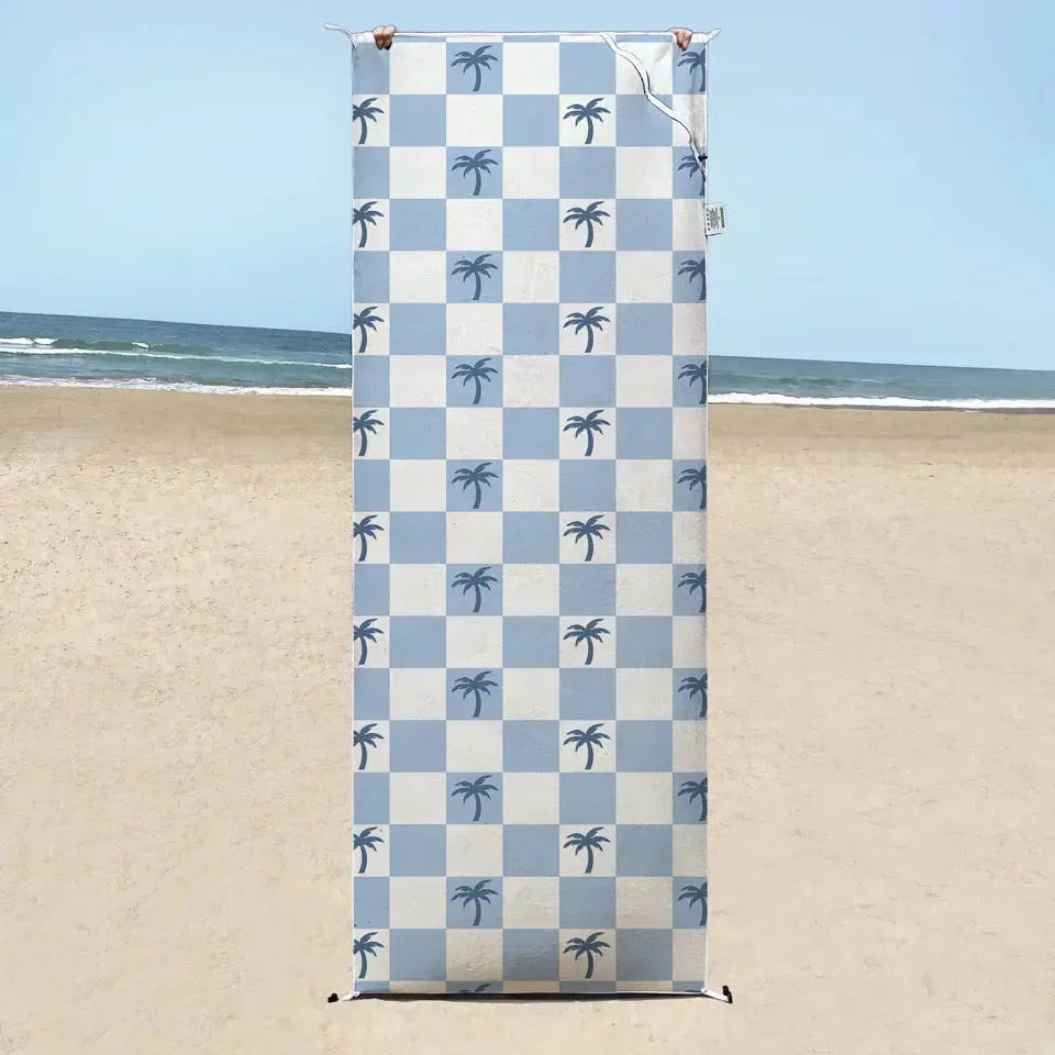 Malibu Blue Checkered sand free  Beach Towel With Pocket on white sand beach in Australia